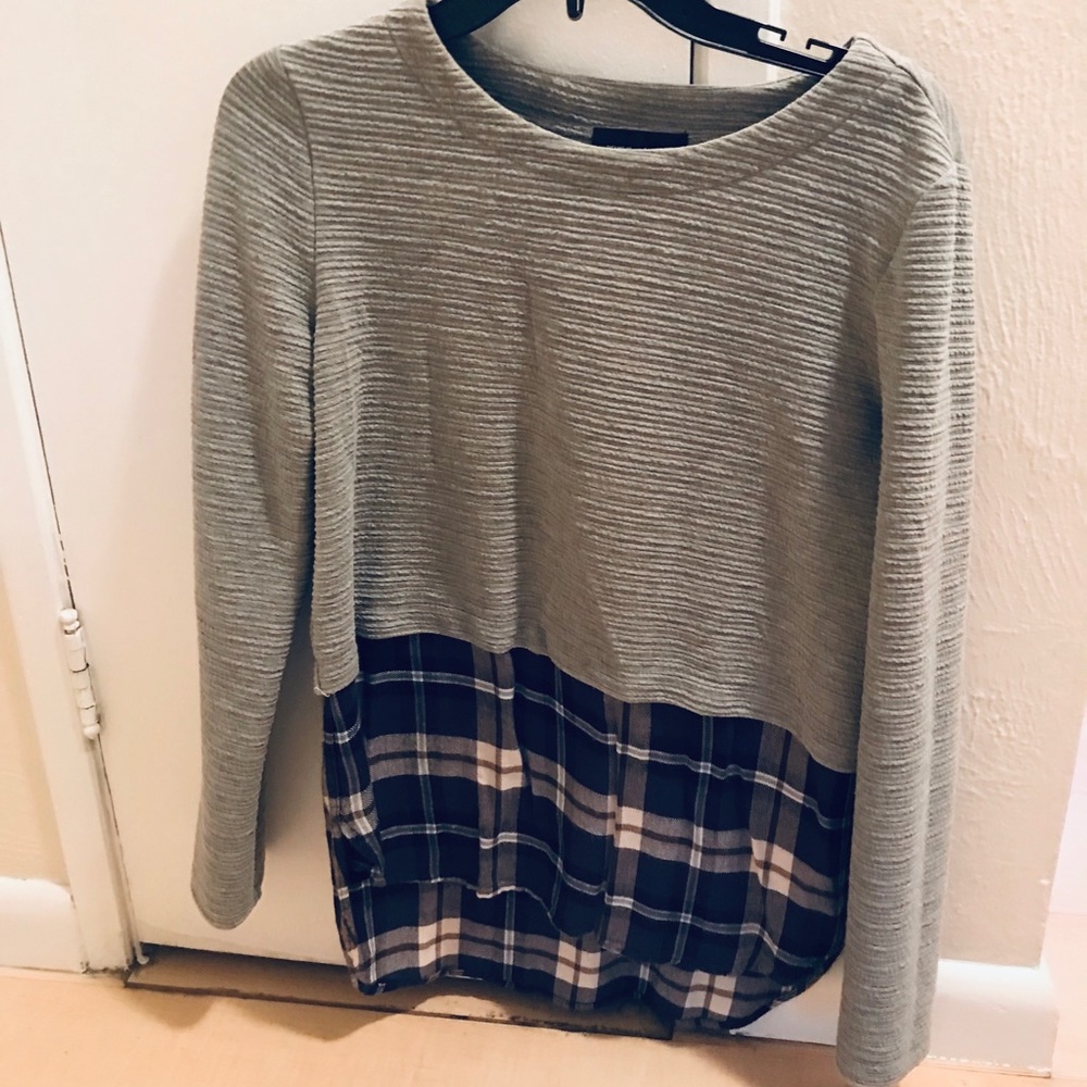 Gray/flannel sweatshirt.